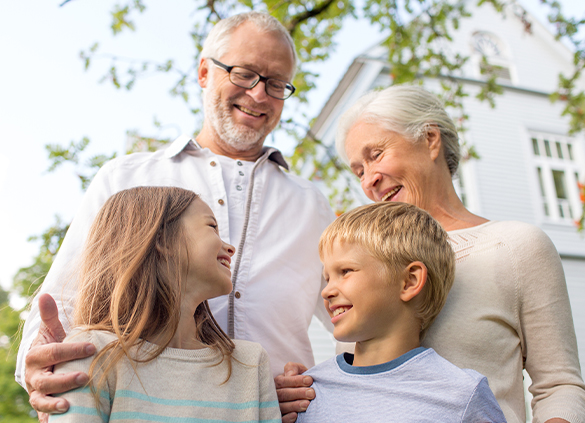 grandparents with grandchildren smiling benefits of life insurance louisville ky evansville il