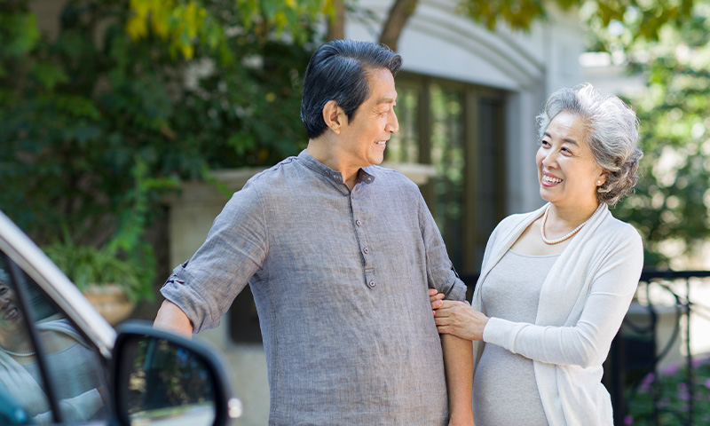 smiling senior couple benefits of fixed indexed annuities